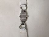 a white purse with a metal clasp on it