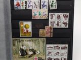 a picture of a refrigerator with stamps and stamps on it