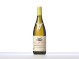 a bottle of wine that is sitting on a table