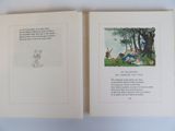 an open book with a picture of a man and a woman in the woods