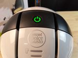 a close up of a juice juicer on a table