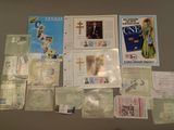 a lot of stamps and postcards on the table