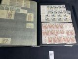 a lot of stamps on the pages of a book