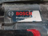 a close up of a bosch logo on a car