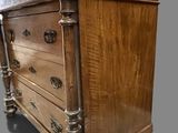 an old wooden chest of drawers with metal handles and handles