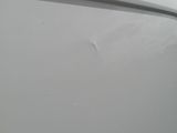 a close up of a white boat on the water