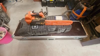 a tool case with tools on top of it in a garage
