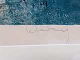 a picture of a picture of a person on a surfboard in the water