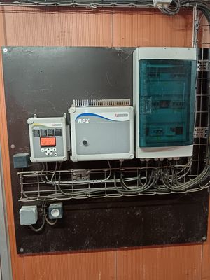 a machine that is connected to a wall with wires