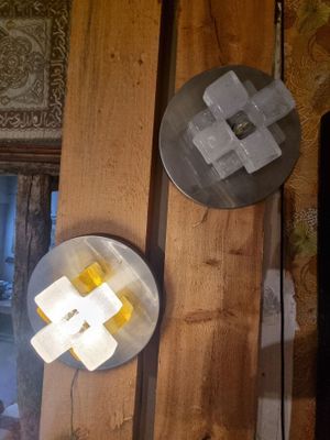 two plates of food on a wooden table next to a television