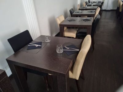 a long table with place settings and place settings on it