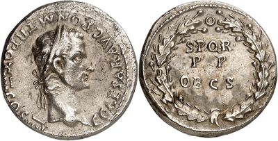 a silver coin with an image of a man on it