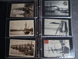 an old photo album with a lot of old photos on it