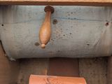 a wooden box with a piece of paper on top of it