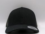 a close up of a black baseball cap on a white background