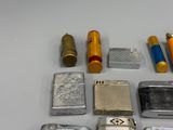 many different types of lighters and lighters laid out on a table