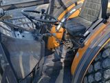 an image of a tractor with a front end loader