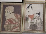 two framed asian paintings of a man and a woman on a beach