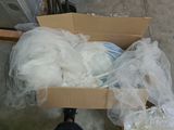 a cardboard box filled with a lot of white stuff