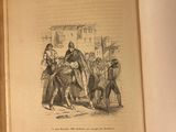 an open book with a drawing of a man on a horse