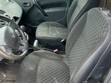 a picture of a car with a steering wheel and seat covers