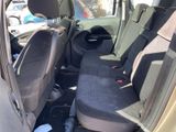 the back seats of a car are empty in the parking lot