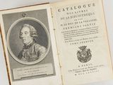 an old book with a picture of a man in a coat of arms