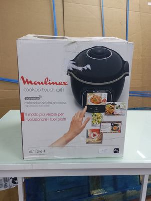 packaging of a microwave oven on a table in a room