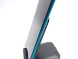 a cell phone that is sitting on top of a stand