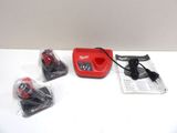 a small red machine that is sitting on a table