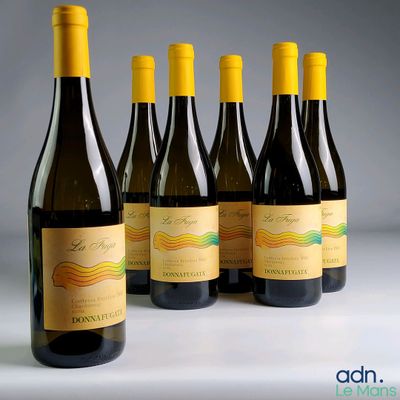 six bottles of wine are lined up on a table