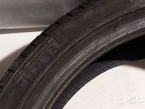 the tire of a car with a flat tire on the side of the road
