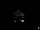 an image of a black diamond in the dark