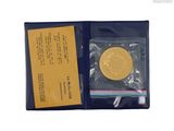 an image of a gold coin is in a plastic bag