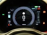 the dashboard of a car with a digital display on it