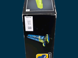 a black refrigerator with a blue and yellow label on it