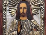 une image représentant Jésus avec une auréole au-dessus de la tête
