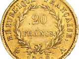 a gold coin with the number 20 on it