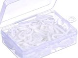 a clear plastic box filled with lots of white rings