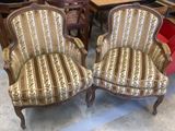 pair of upholstered upholstered chairs in a store