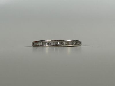 an image of a wedding band with baguets of diamonds