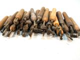 many different types of wood shavings laid out on a table
