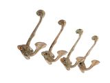 three metal hooks with birds on them on a white background