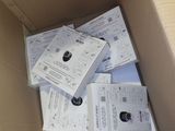 a cardboard box filled with lots of papers and tickets