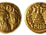 une pièce d'or portant l'image d'un homme et d'une femme