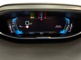 the dashboard of a car with a digital display in the center