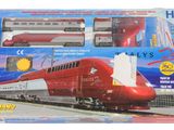 un train rouge et blanc sur des rails, dans une boîte