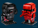 two lego star wars figures that are standing next to each other