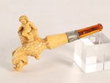 a pipe that is sitting on top of a glass block