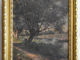 an image of a painting of a tree by a river in a gold frame